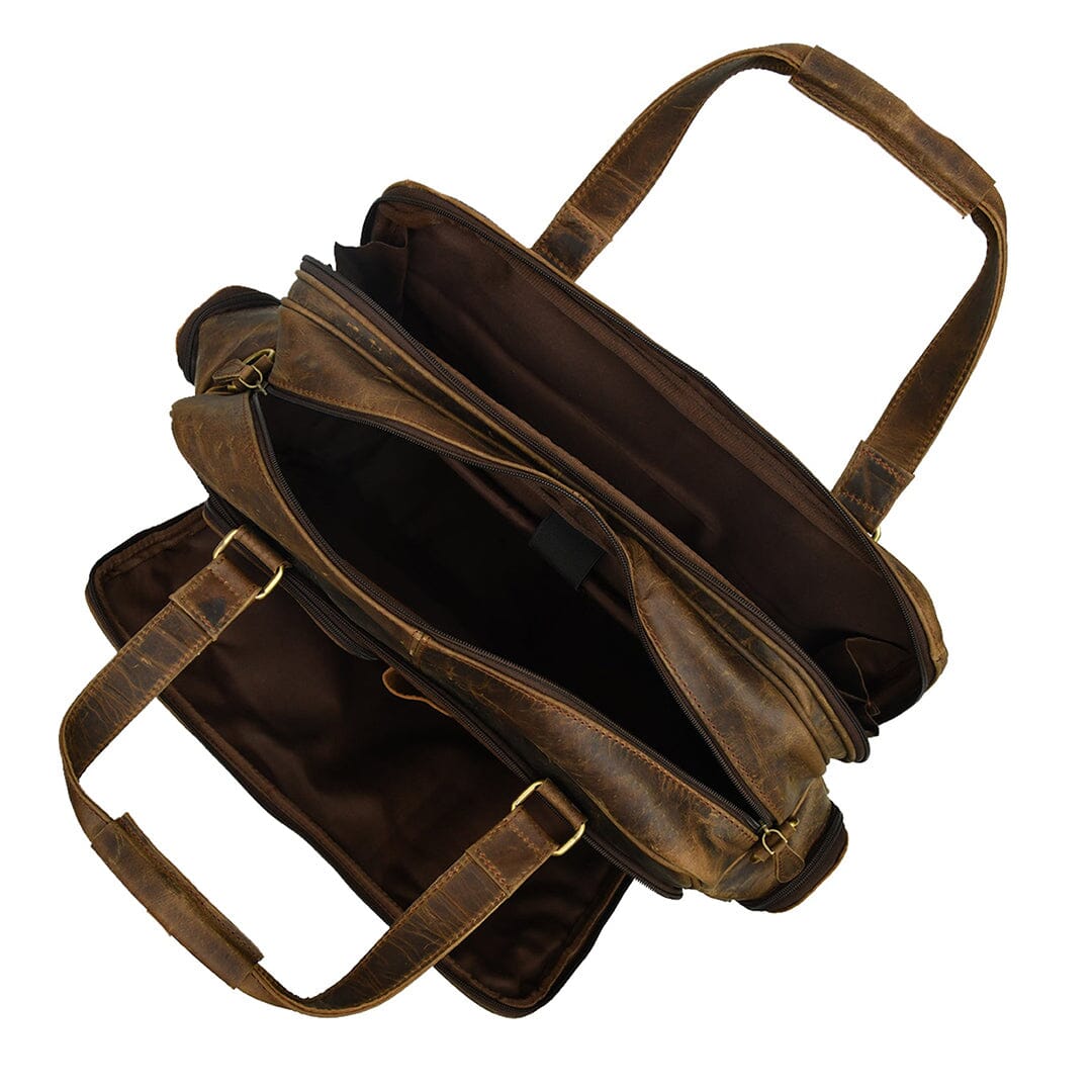Brown leather briefcase interior view showing open top and front organizer sections