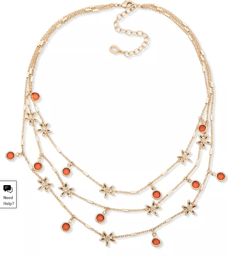 Gold-tone layered charm necklace with orange stone beads and star charms, full view