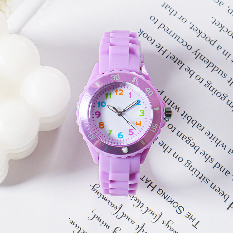 Purple kids analog wristwatch with silicone strap and colorful number dial