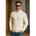 Men's cable-knit turtleneck sweater in off-white, fitted long sleeves, cable knit detail.