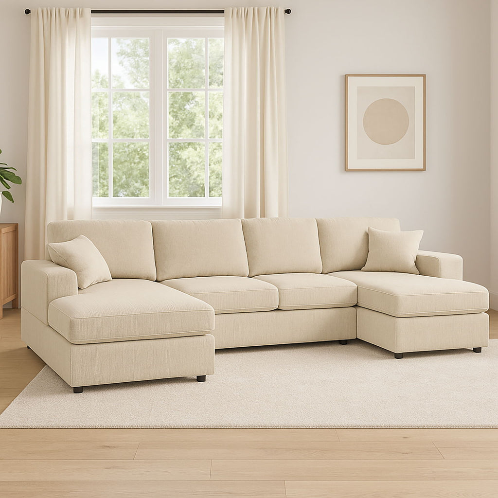 Beige sectional sofa with chaise ottoman and padded back and seat cushions