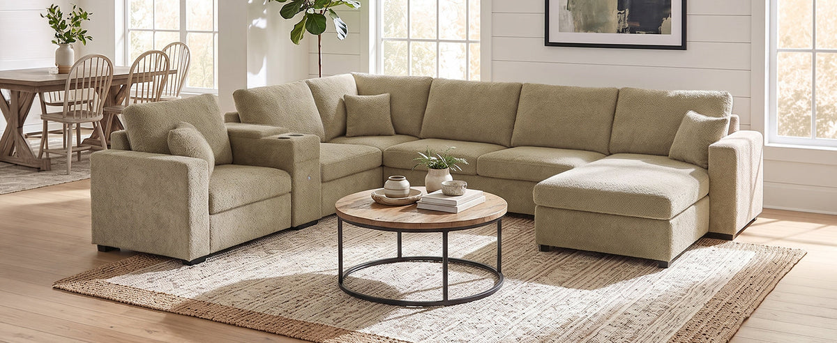 Beige modular sectional sofa with chaise extension and wide seat back cushions