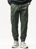 Men's casual cargo pants in dark green with drawstring waist and cargo pockets