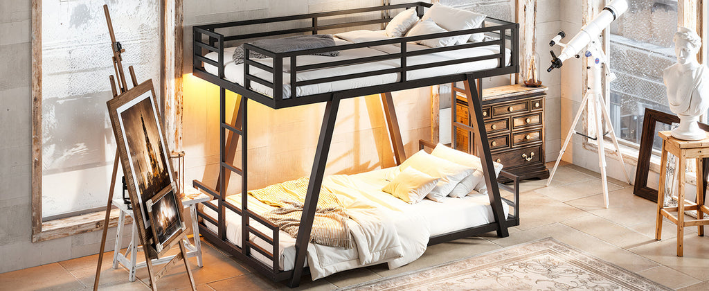 Black metal twin-over-twin bunk bed with slatted rails and bedding