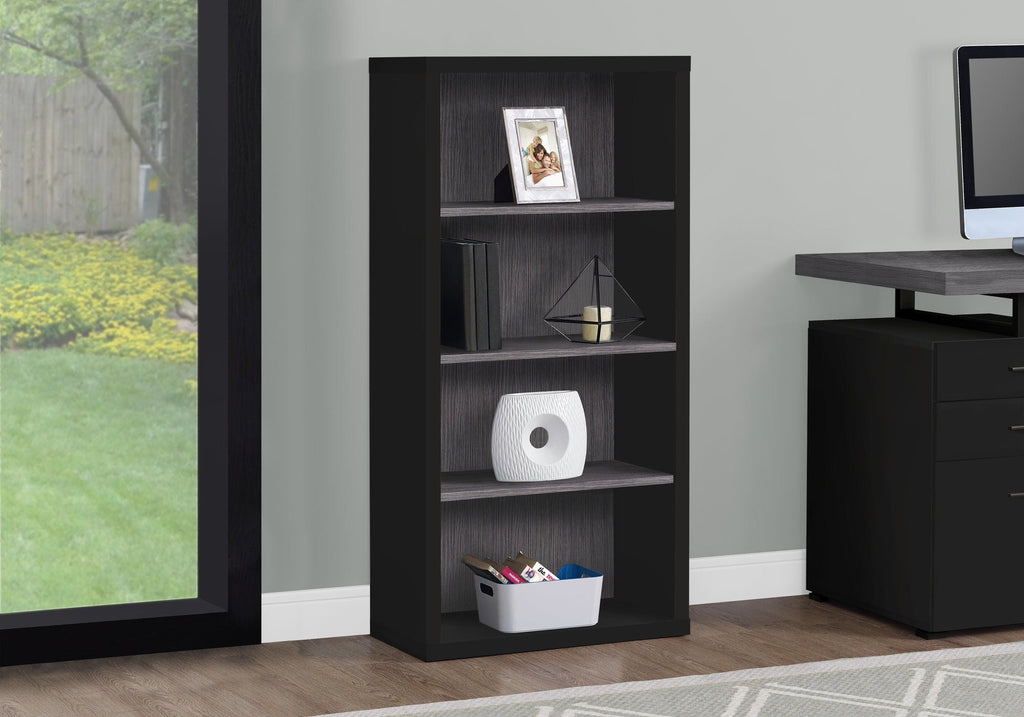 Black 5-tier office bookshelf with open storage and decor items near a window.