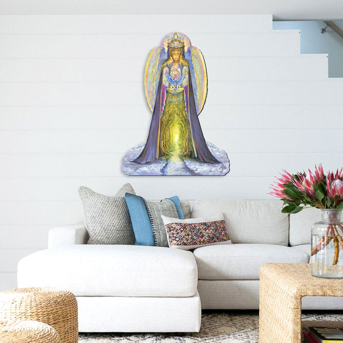 Angel holiday yard sign with blue wings and glowing gold robe on an oval base