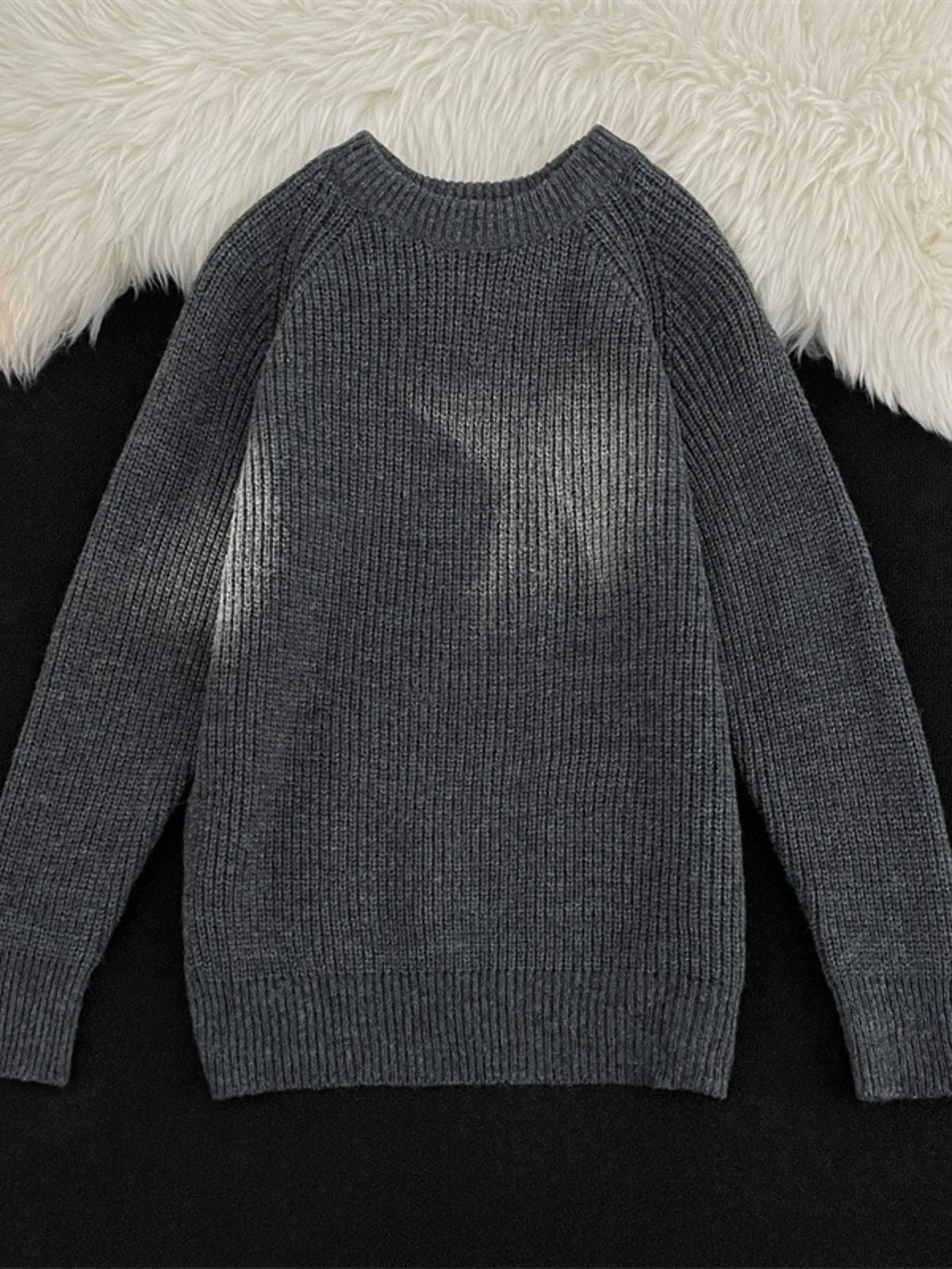 Dark gray knit round-neck long-sleeve sweater with ribbed cuffs and hem