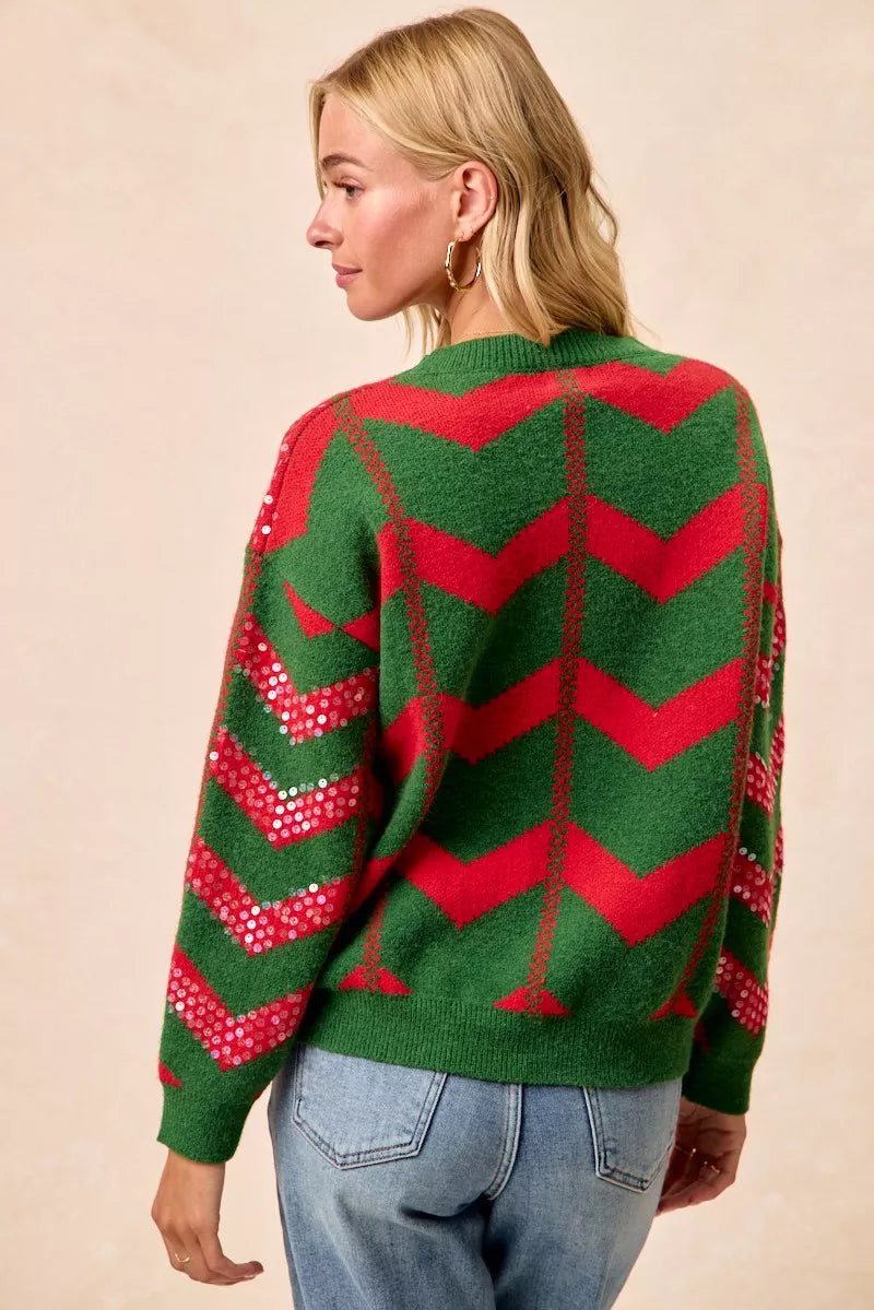 Green chevron knit sweater with red sequin zigzag pattern, back view