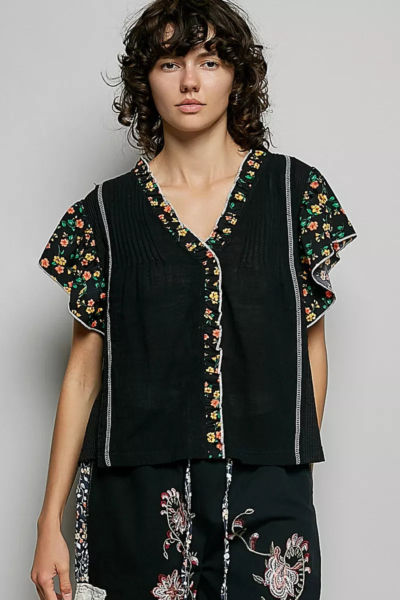 Black V-neck floral ruffle sleeve blouse with button front and pintuck trim