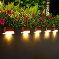 Solar LED deck step lights, 8-pack, dark housings with warm glow