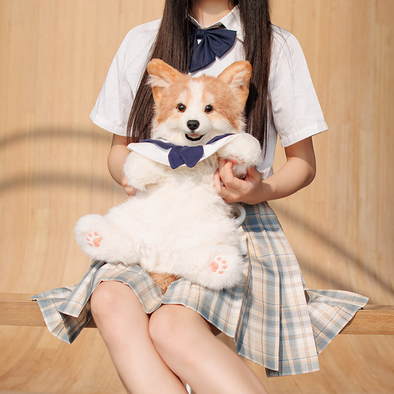 Corgi plush backpack worn over a white shirt, featuring navy bow and plush paws