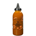 Spicy chipotle squeeze bottle with amber sauce and black cap, 14 oz
