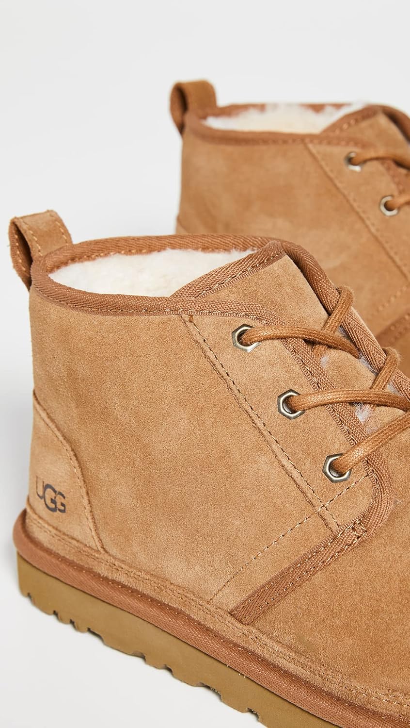 Chestnut brown suede chukka boot with lace-up, seam details, and UGG heel label