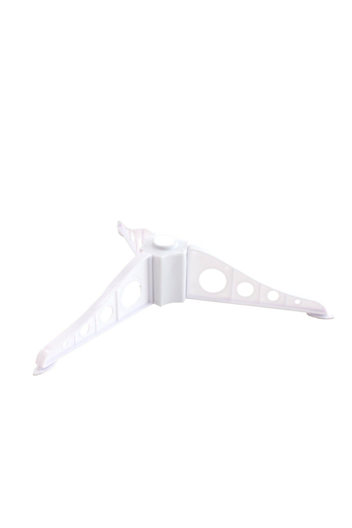 White plastic tabletop tree stand with three-legged base and mounting clips