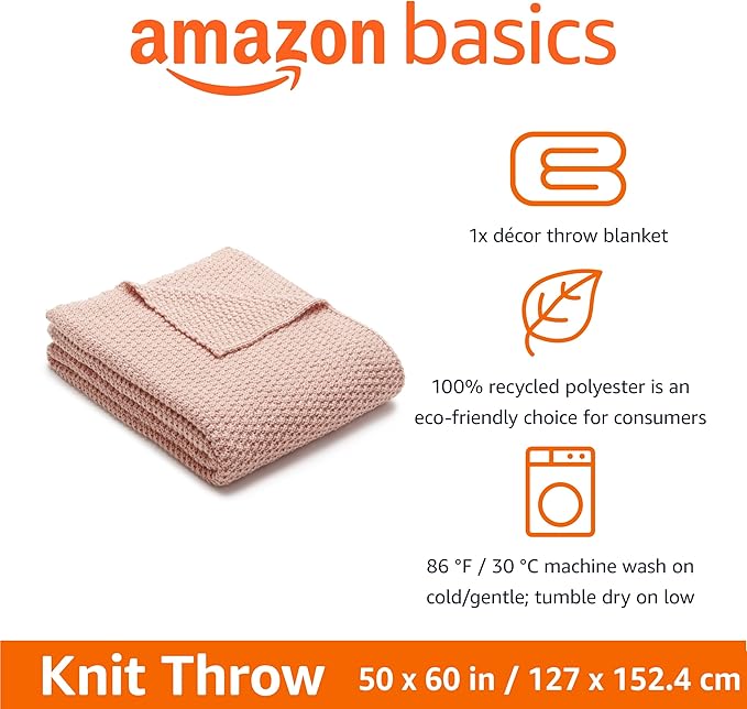 Dusty rose chunky cable knit throw blanket folded, textured cable pattern