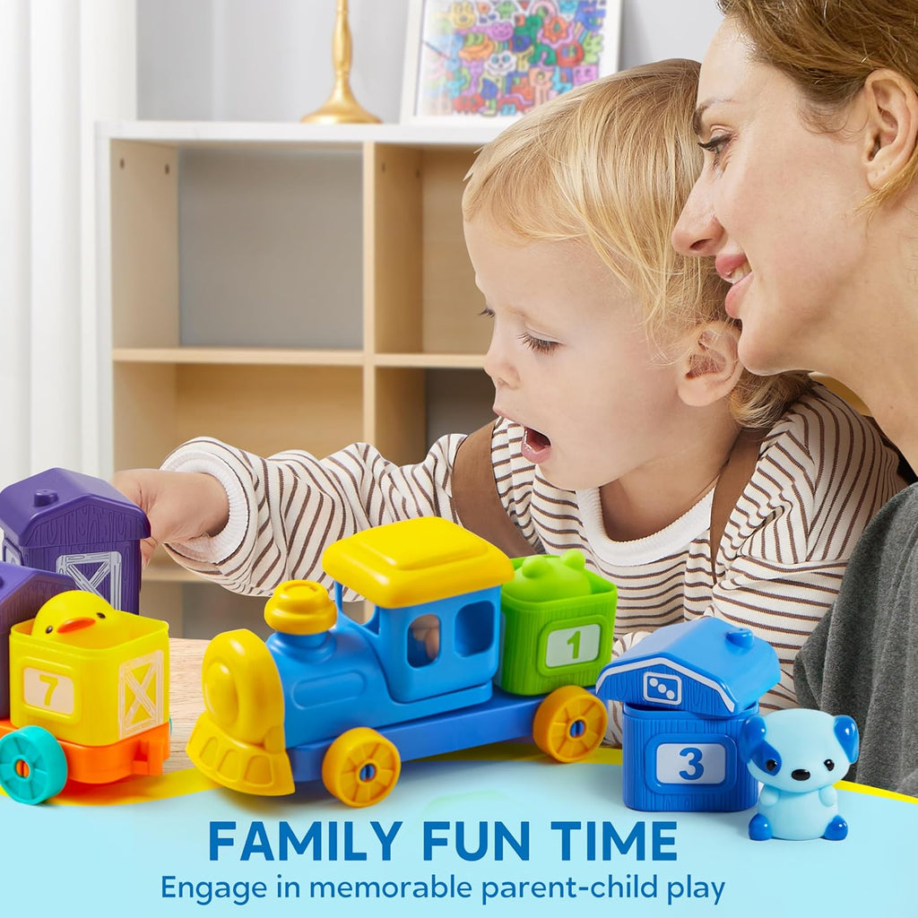 Parent and child playing with colorful farm train and animal figures on a table