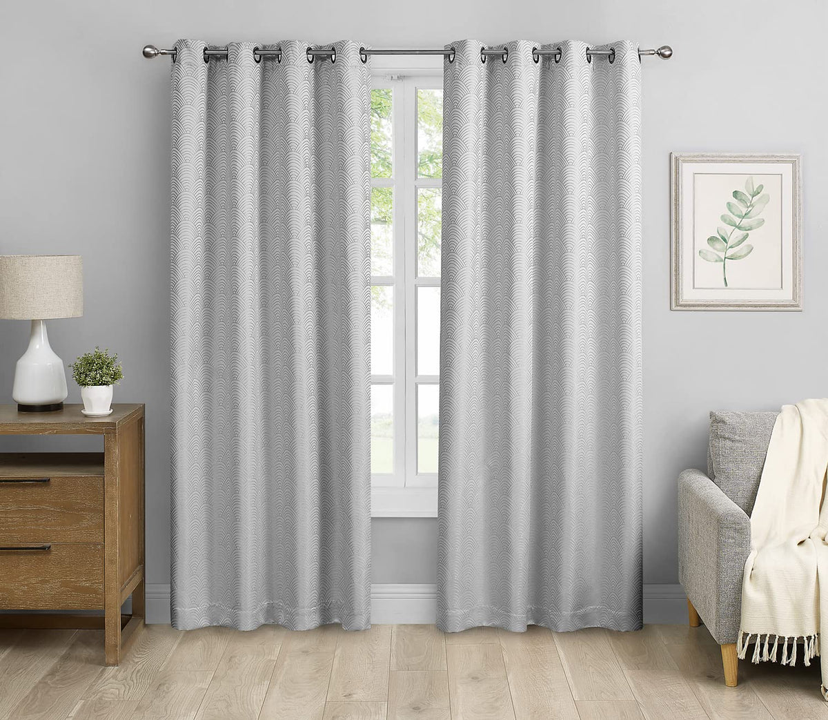 Silver blackout window curtains, 2 grommet-top panels with textured vertical stripe pattern.