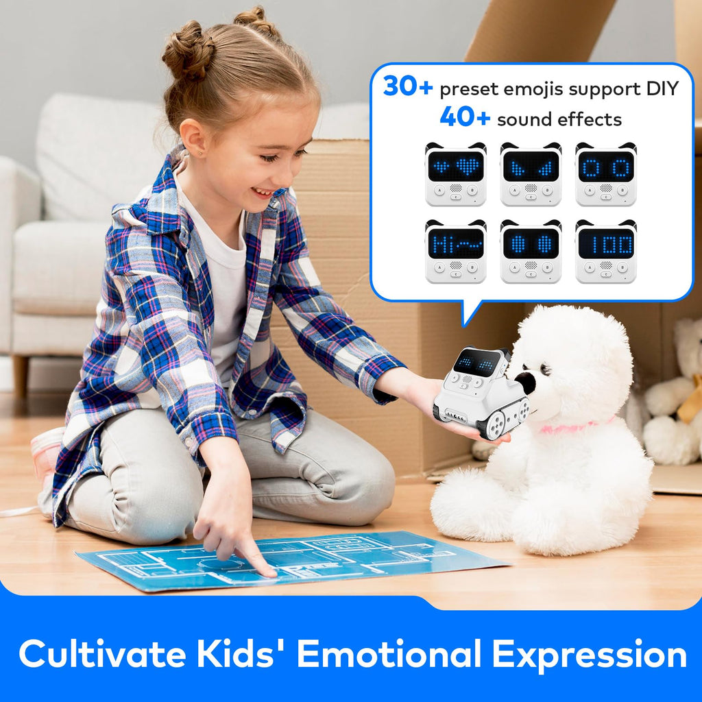 White coding robot toy with blue LED screen, held by a child.