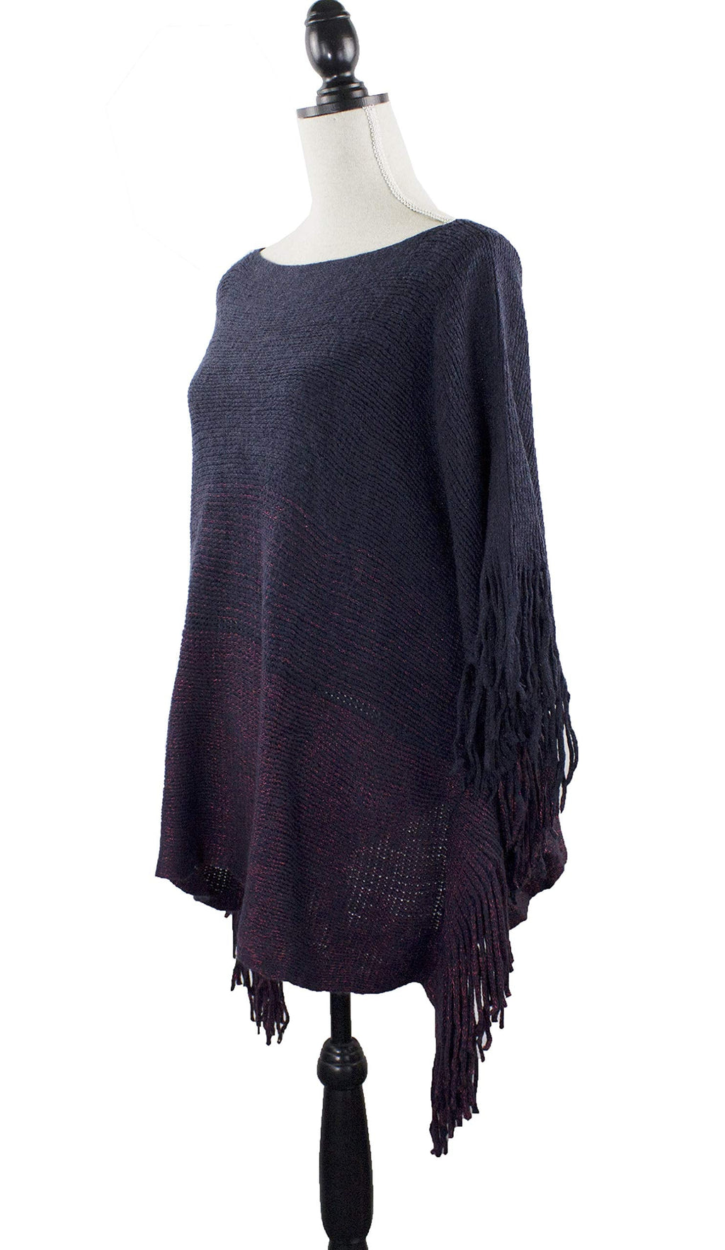 Two-tone knit poncho sweater with long fringe tassels, dark navy with burgundy striped panel