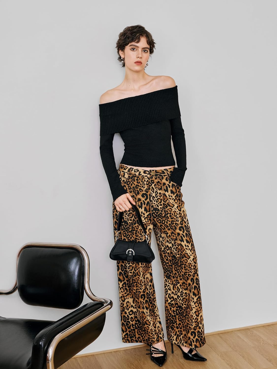 Black off-shoulder knit sweater top with long sleeves