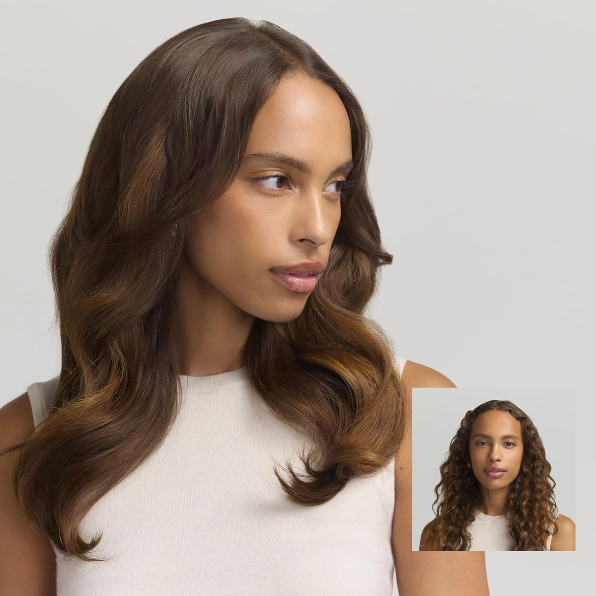 Woman with long wavy brown hair styled with multi-styler, front portrait