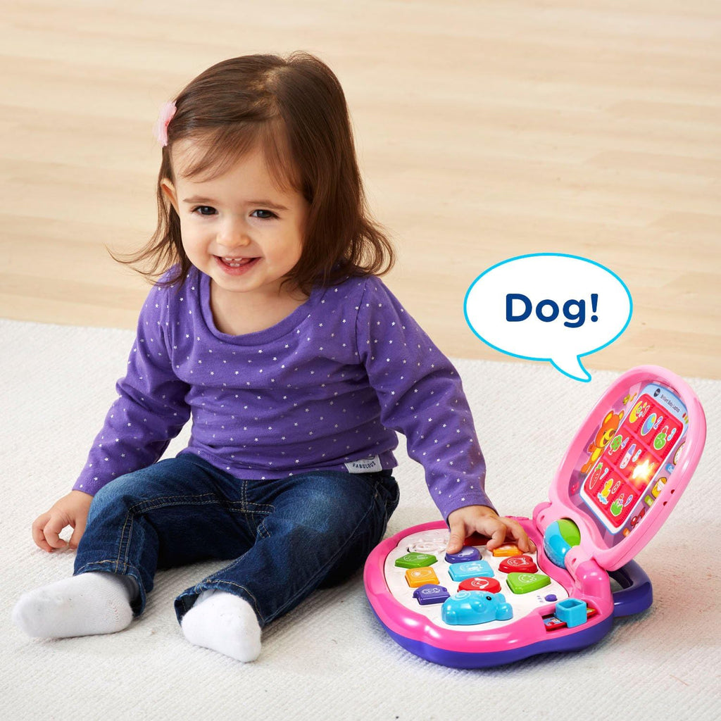 Pink interactive toddler laptop toy with colorful keys and animal icons for early learning.