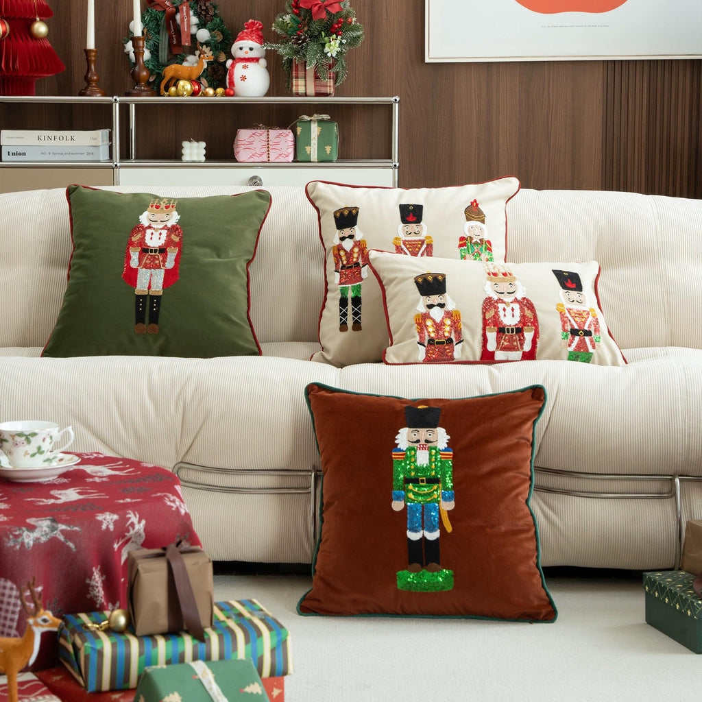 Nutcracker pillow cover set: green and white covers with embroidered figures and red piping