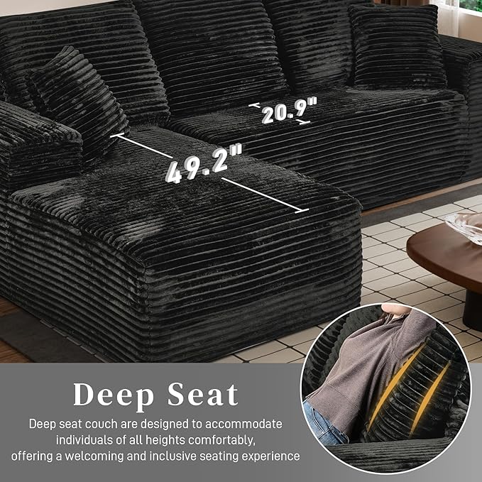 Black corduroy chaise section with thick, deep seat cushions and armrest