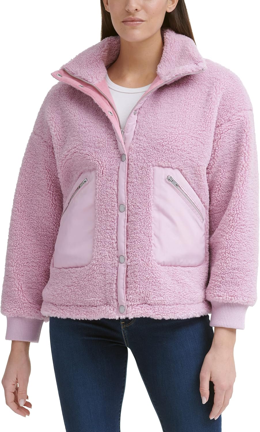 Lilac-pink sherpa teddy jacket with high collar, zip front, and two zip pockets