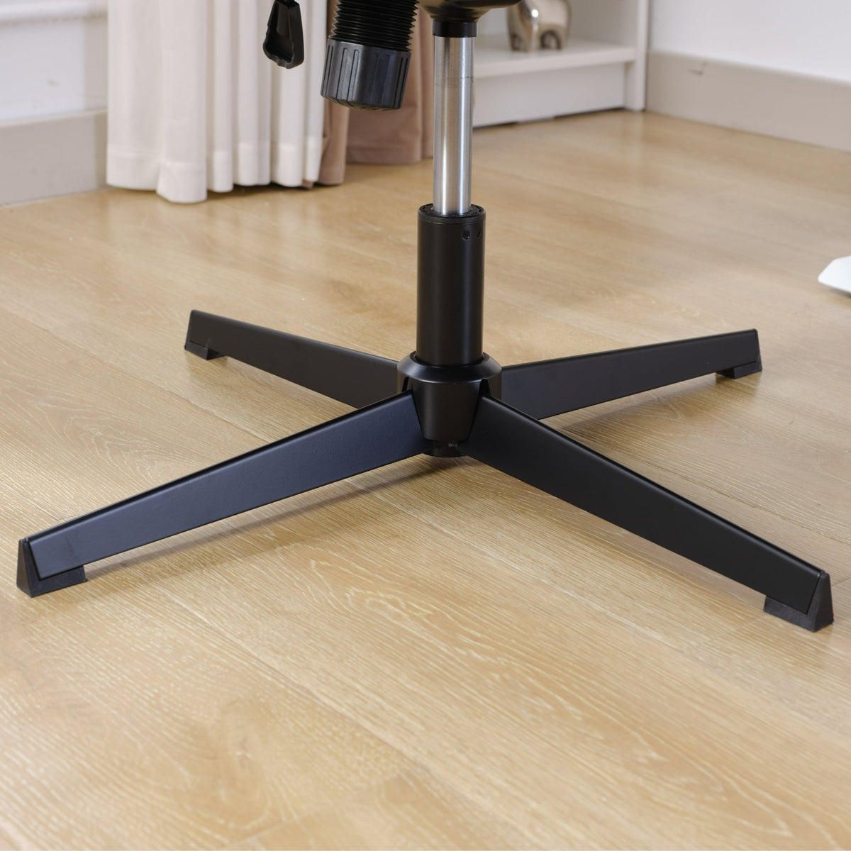 Black five-star chair base with central pedestal, no wheels