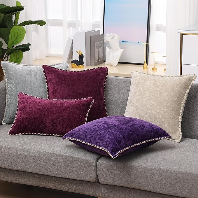 Plum chenille euro pillow cover set with stitched border on a gray sofa