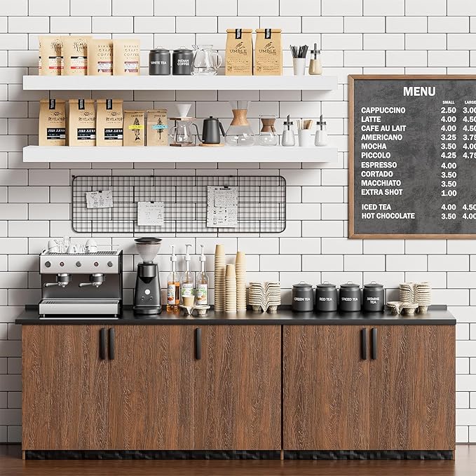 White floating wall shelves above cafe counter holding bottles, cups, and accessories