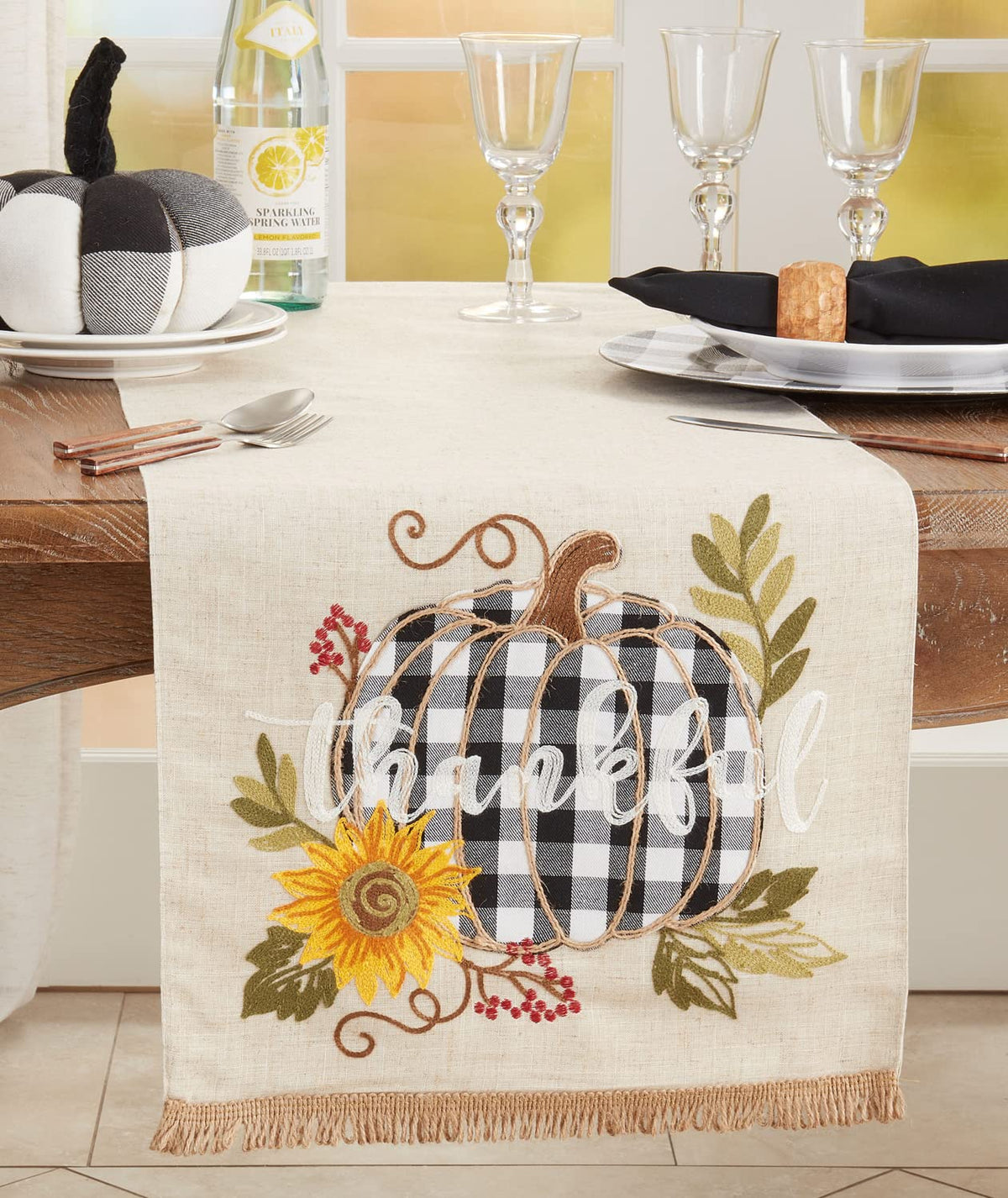 Natural table runner with plaid pumpkin and sunflower leaf design, fringed border