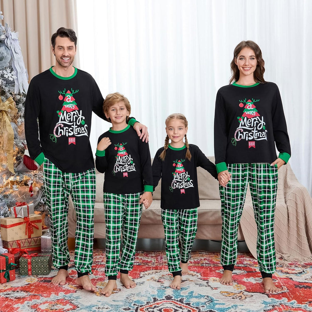Matching family Christmas pajama set: black long-sleeve tops with green trim and green plaid pants