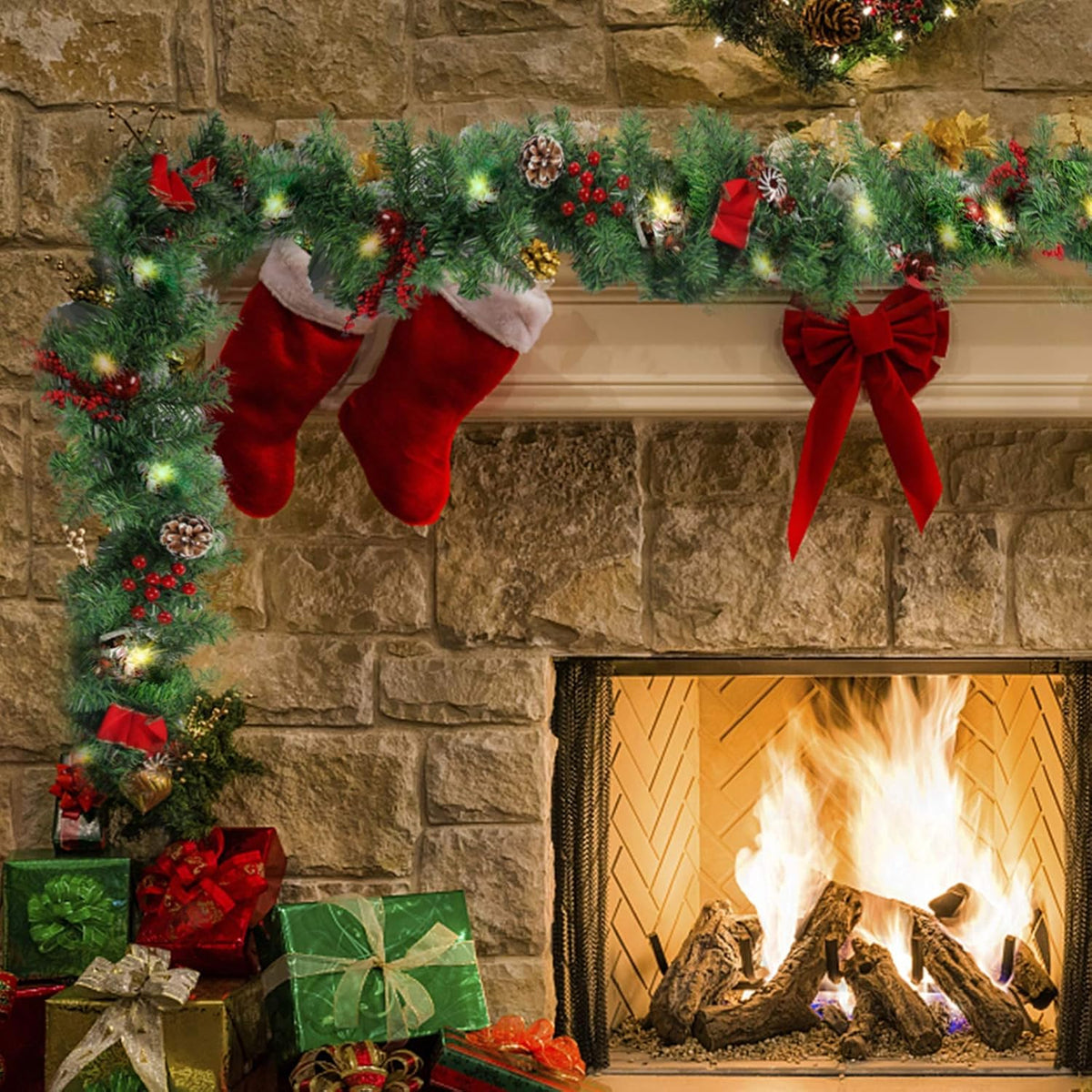 LED Christmas garland with pine tips, red stockings, bows, berries, pinecones, and warm lights