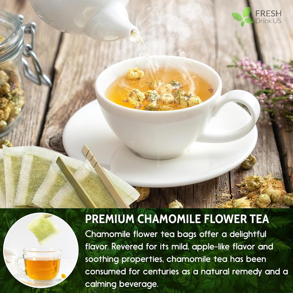 Cup of brewed chamomile tea with visible chamomile flowers steeping