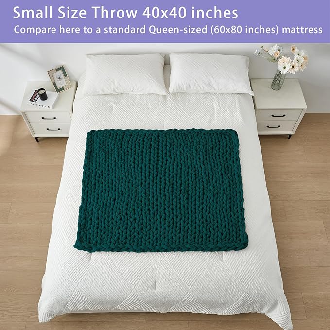 Dark green chunky knit throw blanket, 40x40-inch size shown on bed