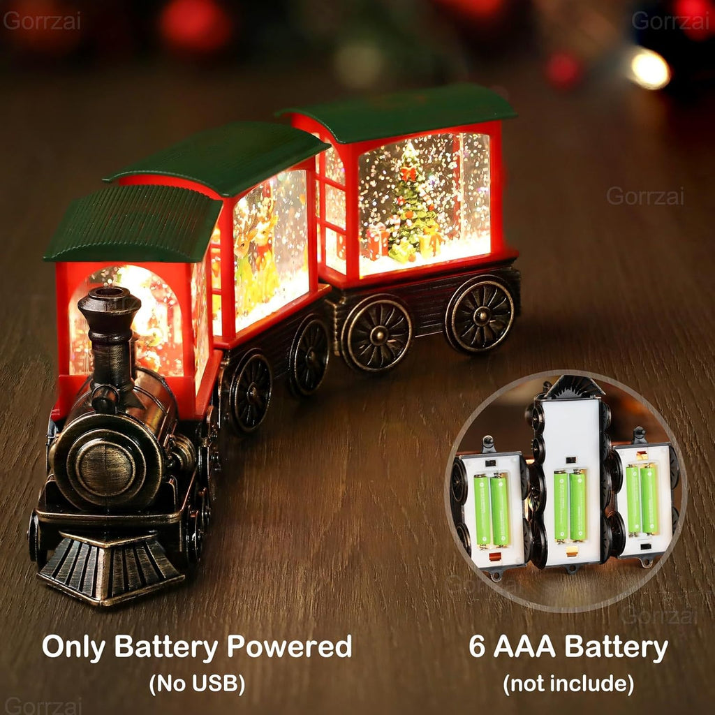 Red train snow globe lantern with glittery Santa window scene and dark bronze wheels