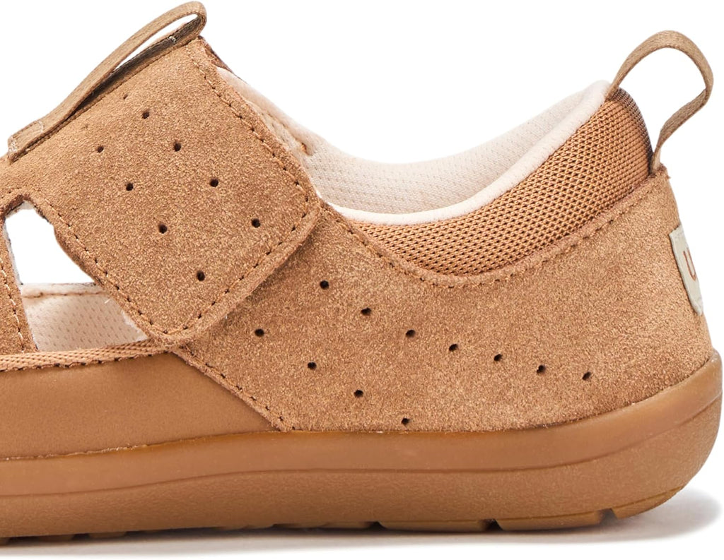 UGG baby sandal close-up in chestnut suede, perforated strap and cushioned sole