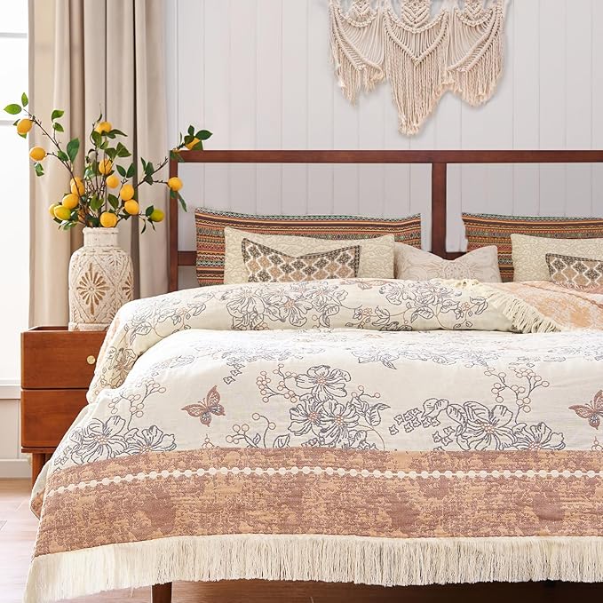 Taupe and white floral cotton blanket with butterfly motifs and tasseled fringe edge