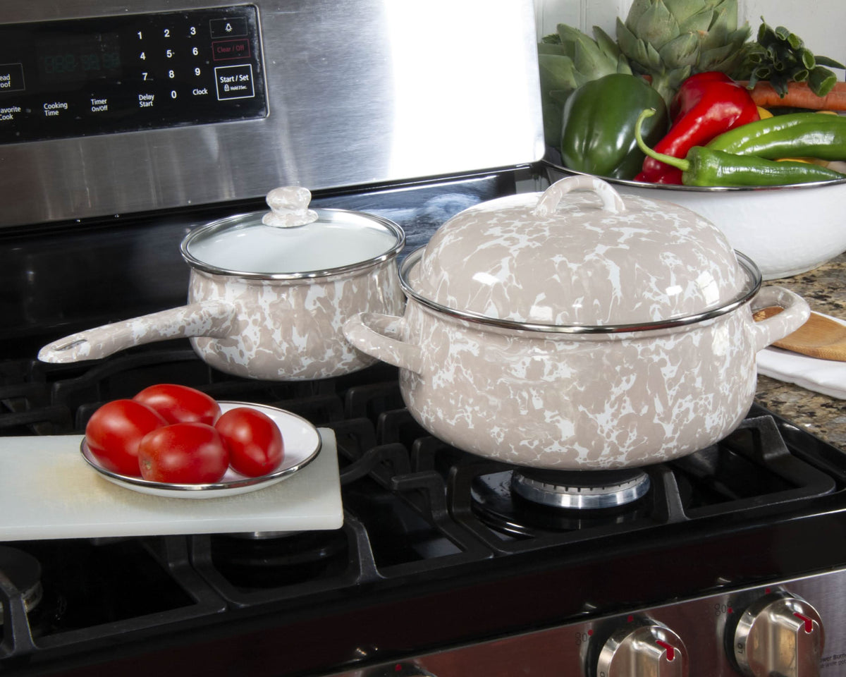 Golden Rabbit 4-quart enamel Dutch oven, taupe speckled with lid on stovetop