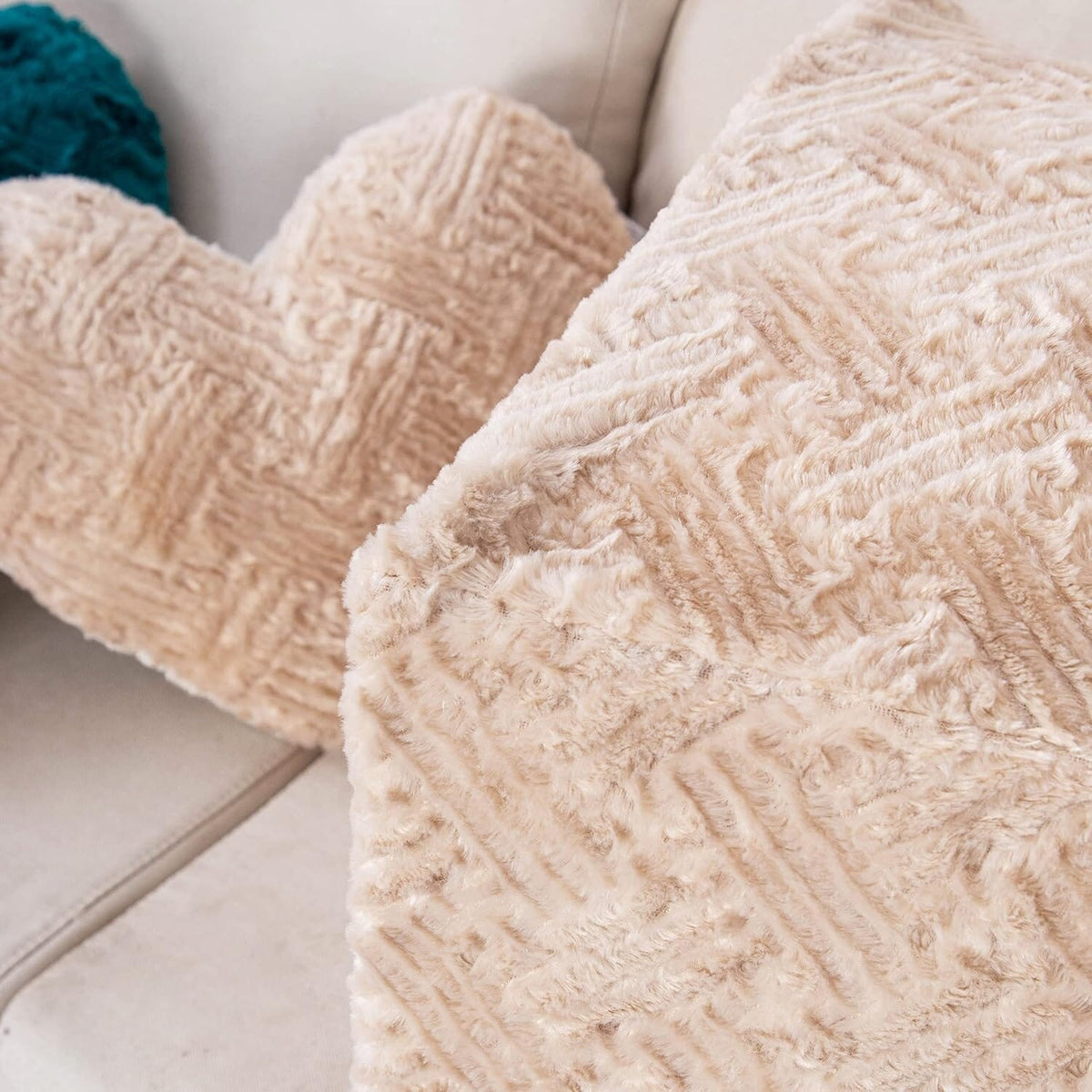 Champagne beige textured plush throw pillow, soft sherpa-like surface