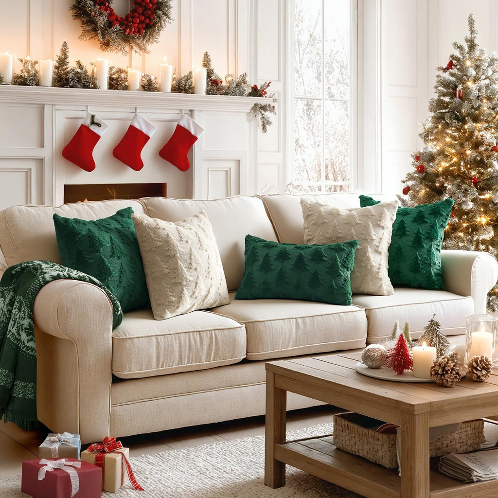 Set of dark green Christmas tree throw pillow covers on a light couch