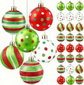 Assorted Christmas ball ornaments, red green white striped and polka-dot hanging decorations