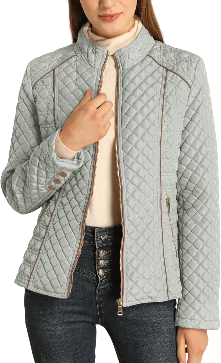 Lightweight quilted puffer jacket with stand collar, full zip, long sleeves in light blue.