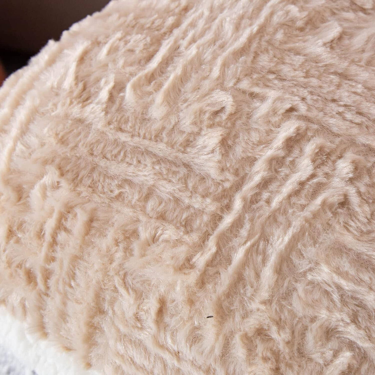 Champagne beige faux-fur sherpa throw pillow, close-up of plush texture