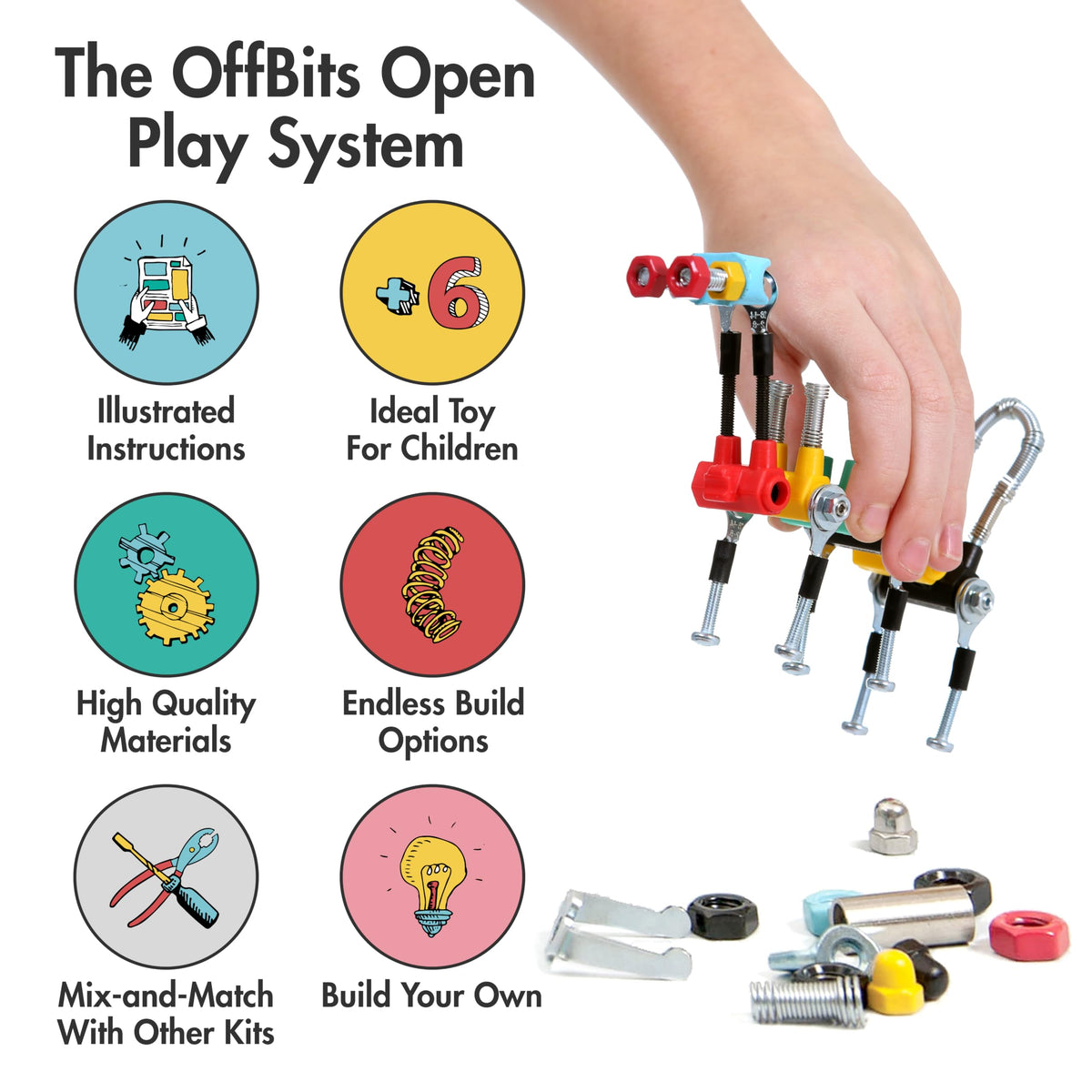 Montessori DIY robot kit, hand holding a multi-part robot model with loose hardware