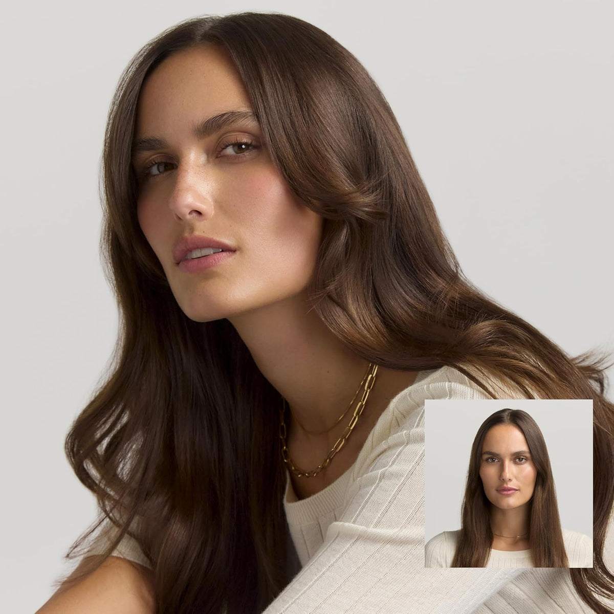 Woman with long wavy brown hair styled with multi-styler, side portrait