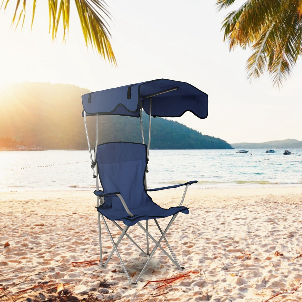 Folding blue canopy beach chair with protective canopy and padded sling seat