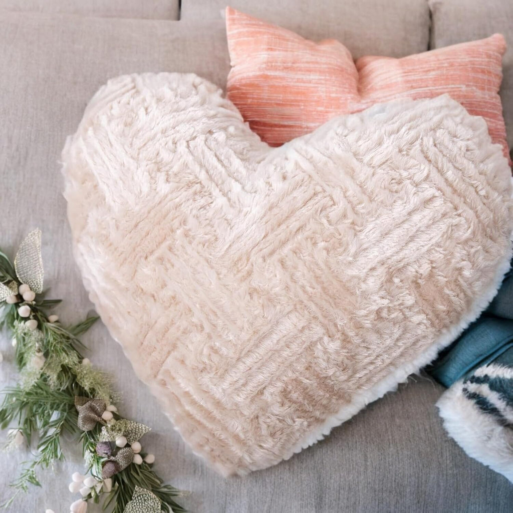 Champagne beige heart-shaped plush throw pillow with fuzzy sherpa texture
